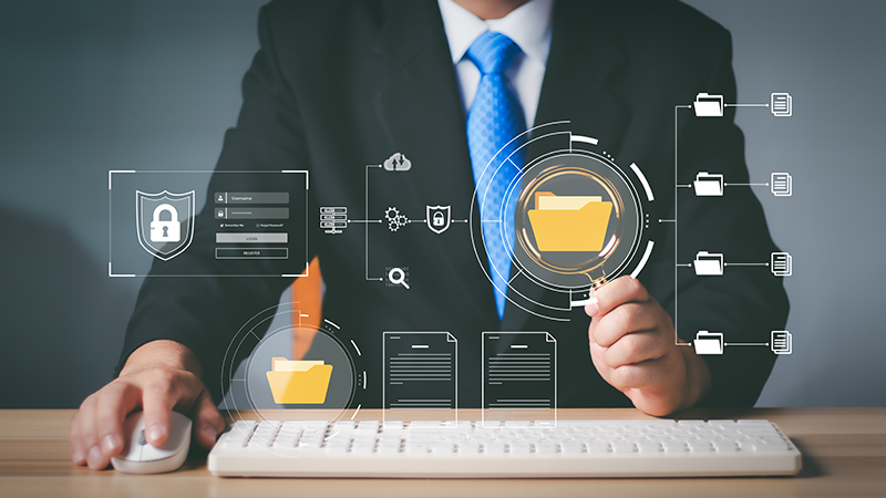 Office scene with man at desktop and digital documents